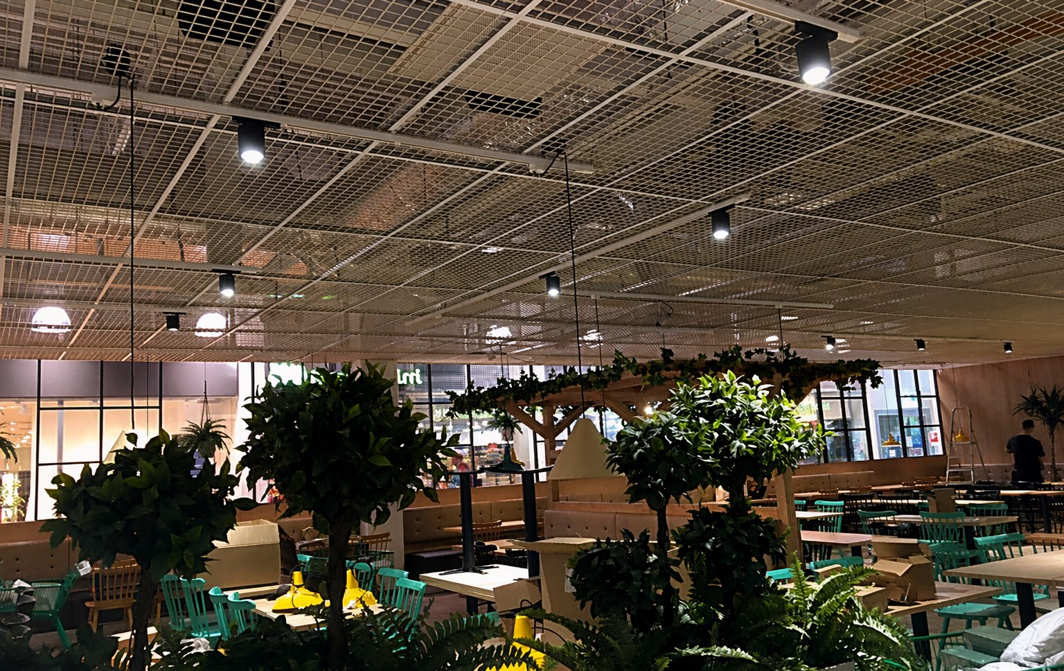 Restaurant — track spots over greenery and dining